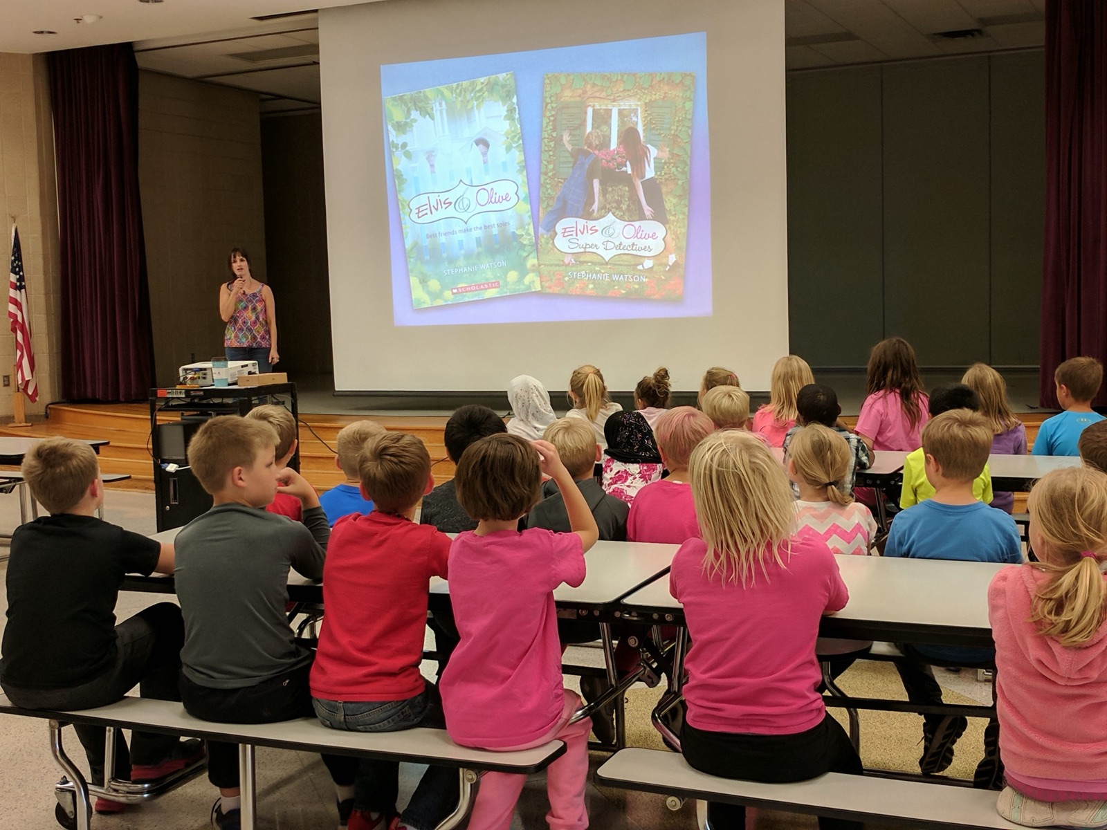 Stephanie Watson presenting Elvis & Olive to a school audience