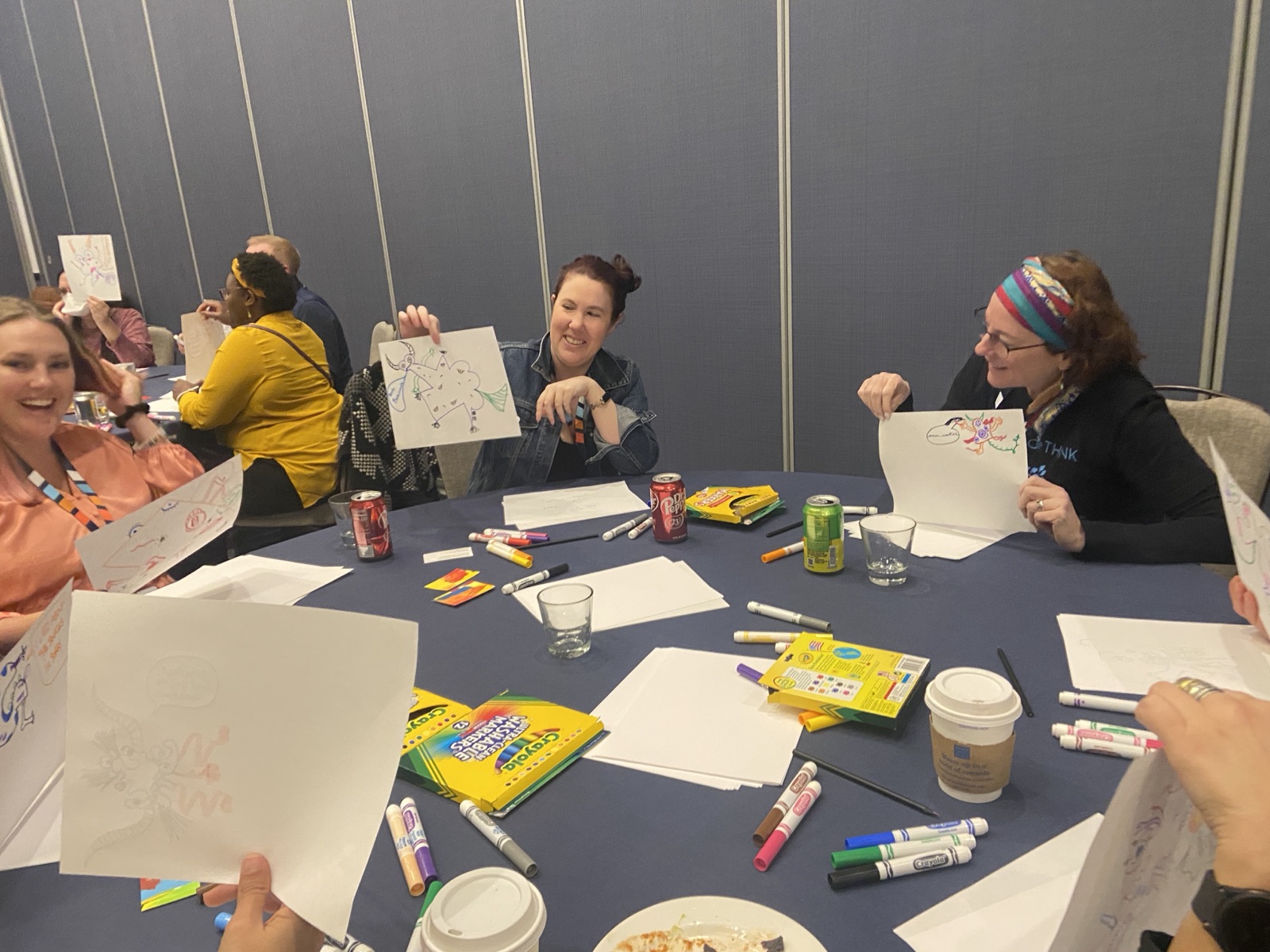 Adults participating in a Drawing Games workshop led by Stephanie Watson.